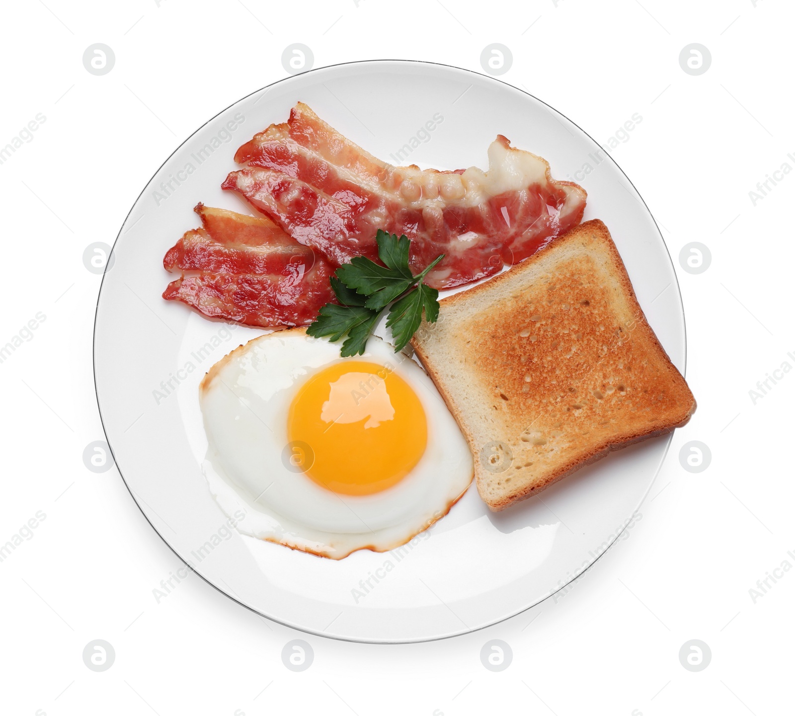 Photo of Plate with delicious fried egg, bacon and toast isolated on white, top view