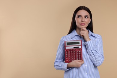 Photo of Thoughtful accountant with calculator on beige background, space for text
