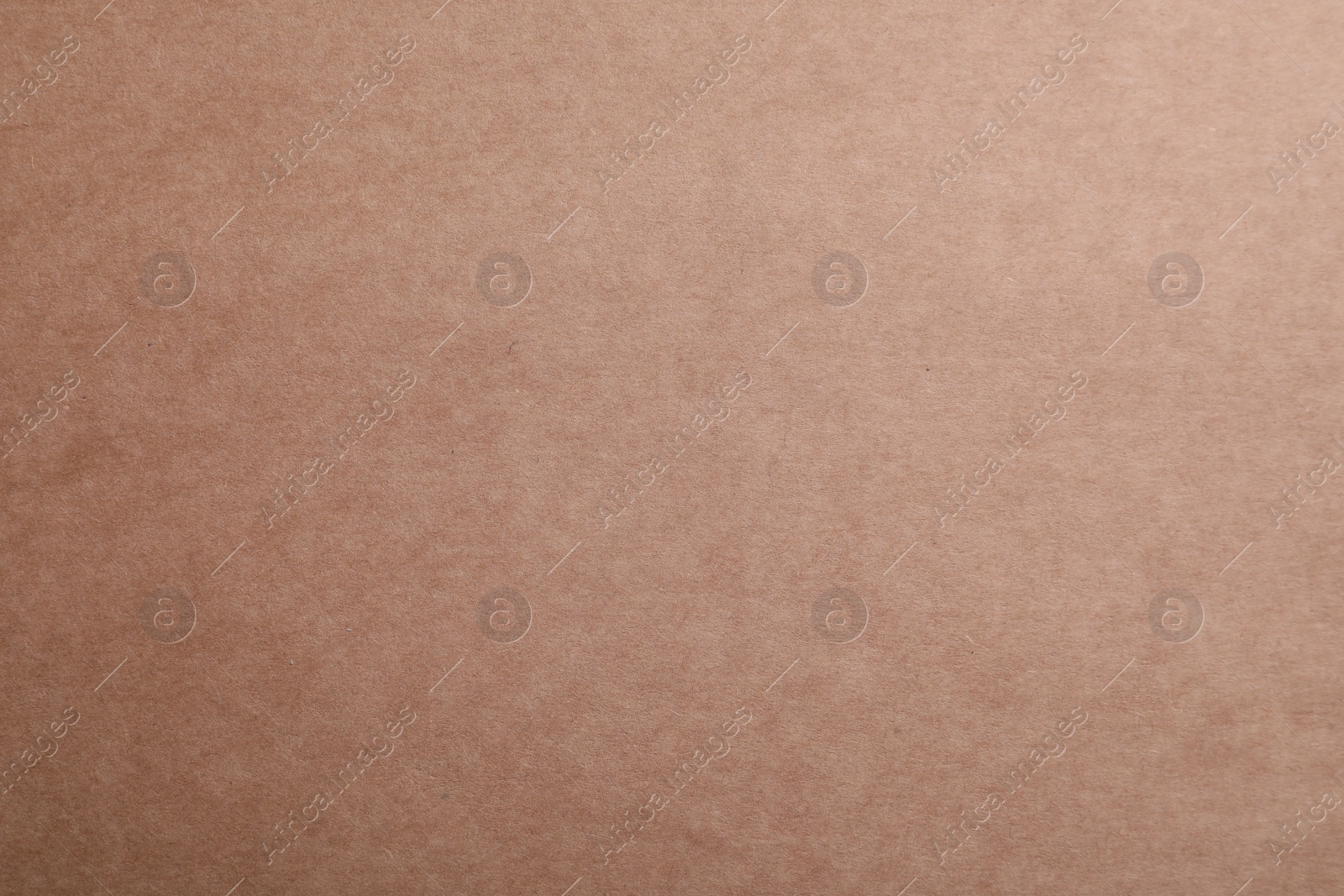 Photo of Texture of kraft paper bag as background, closeup