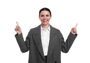 Photo of Beautiful businesswoman in suit pointing at something on white background