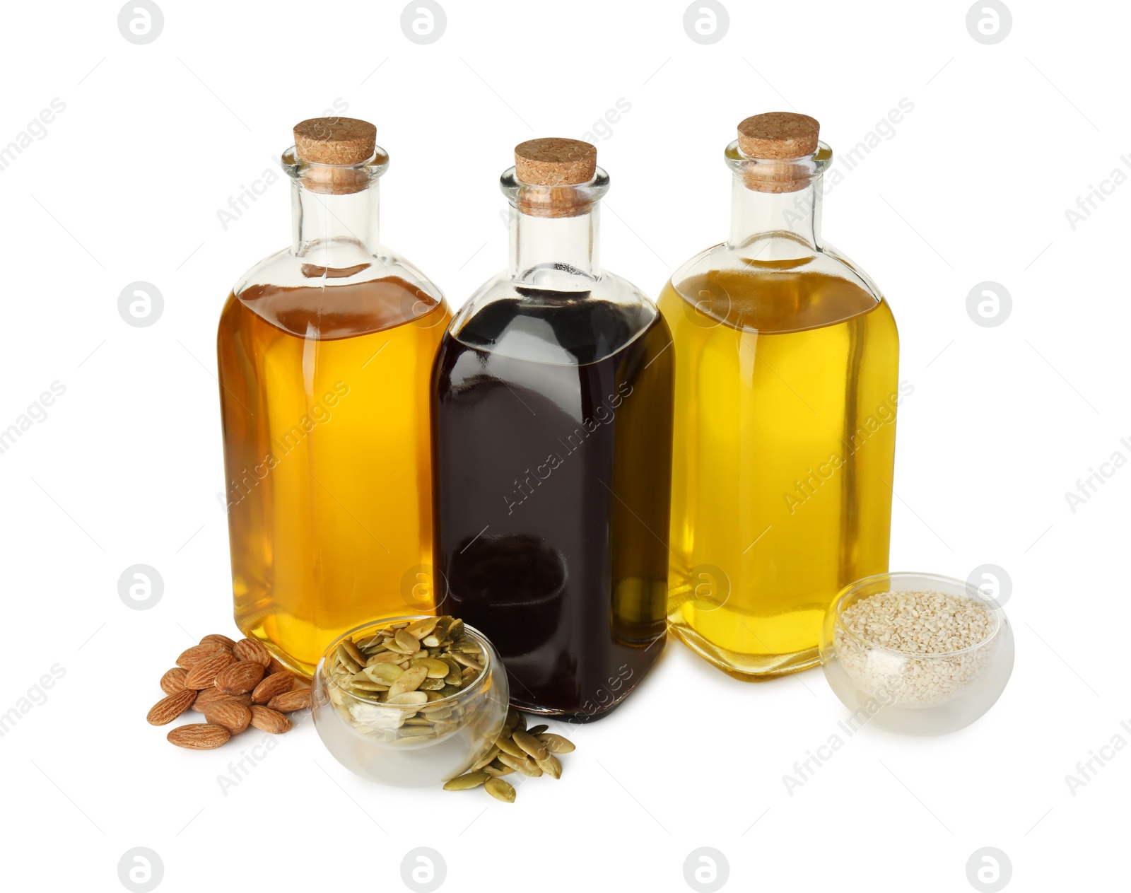 Photo of Vegetable fats. Bottles of different cooking oils and ingredients isolated on white