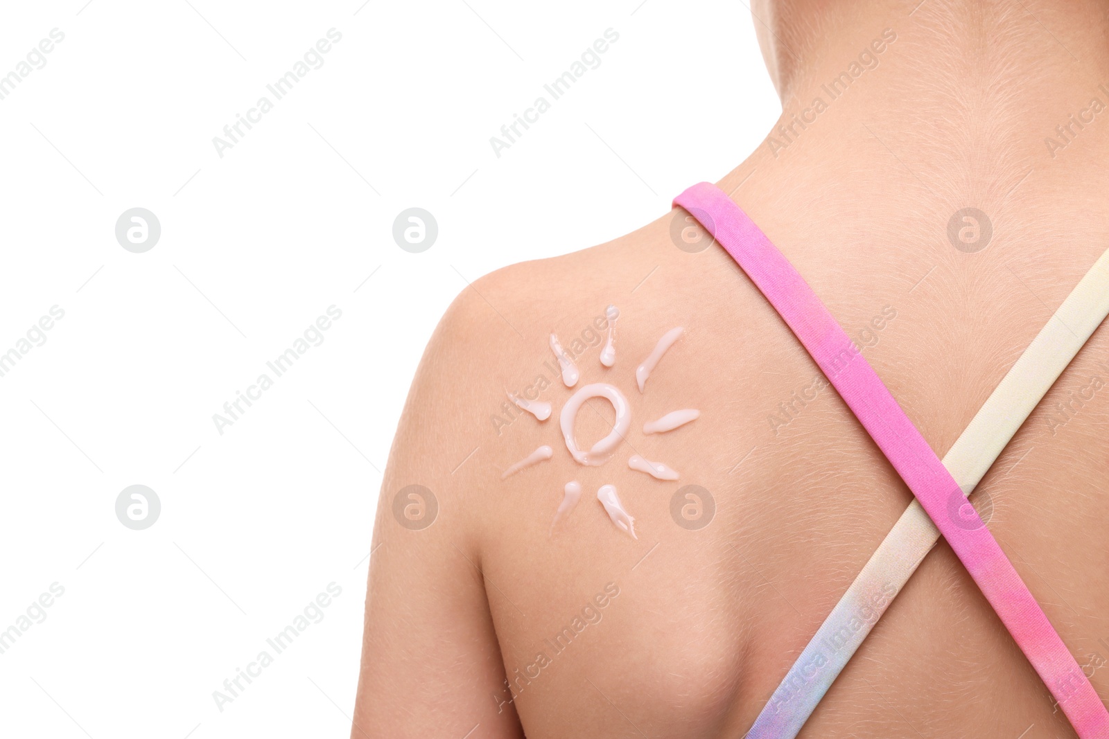 Photo of Girl with sun protection cream on her back against white background, closeup