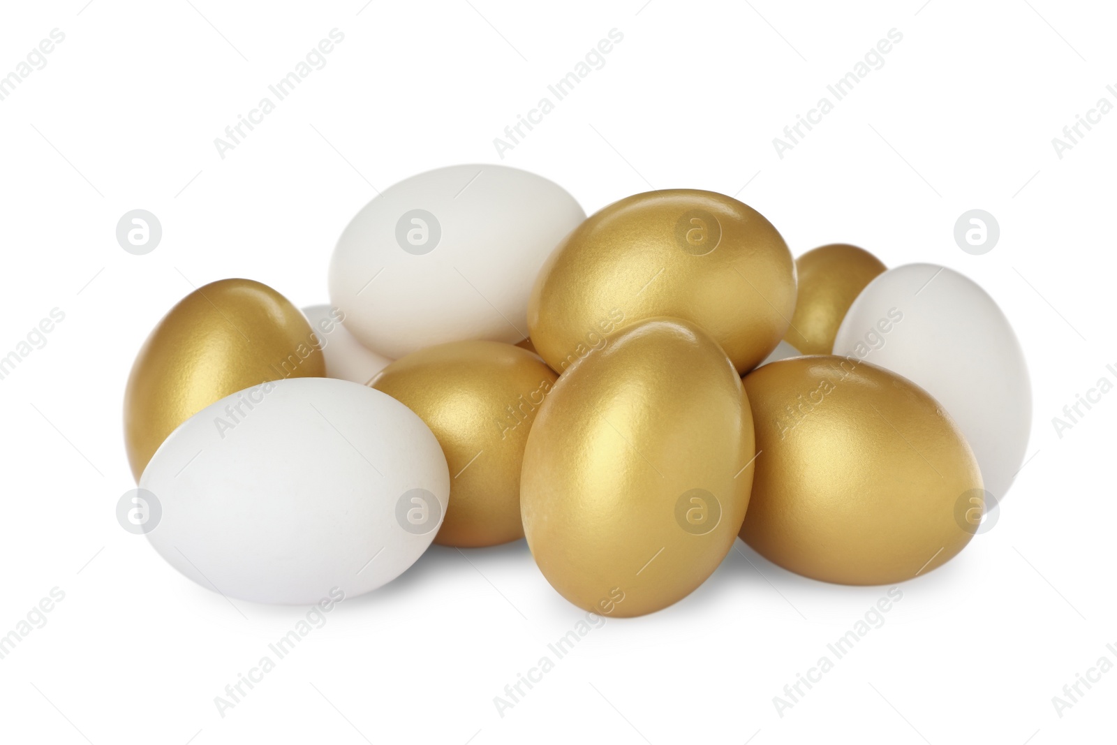 Photo of Golden eggs among ordinary ones on white background