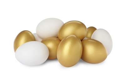 Golden eggs among ordinary ones on white background