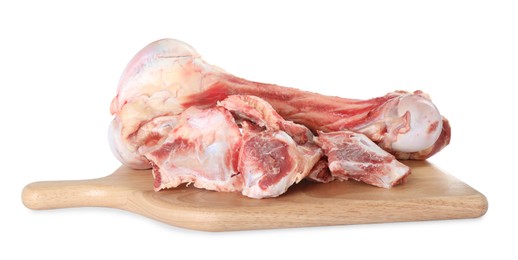Wooden board with raw meaty bones on white background