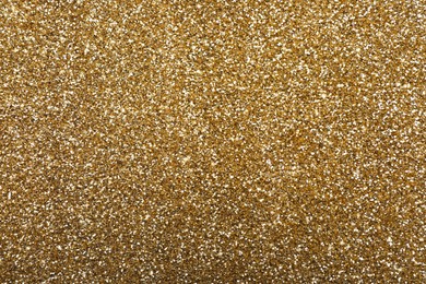 Image of Beautiful shiny brass glitter as background, closeup