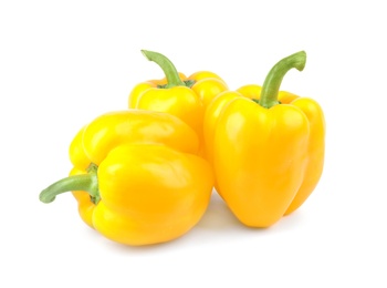 Ripe yellow bell peppers isolated on white