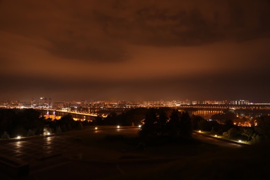 Photo of Beautiful view of bridge with illumination in modern city at night