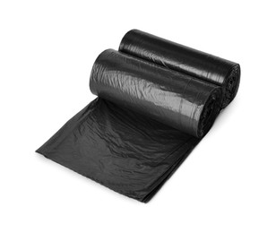 Photo of Rolls of black garbage bags isolated on white