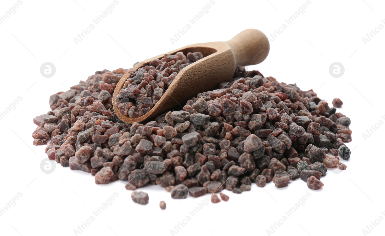 Photo of Pile of Himalayan black salt and wooden scoop isolated on white