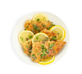 Photo of Delicious chicken piccata with herbs isolated on white, top view