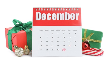 Flip calendar, gifts, Christmas balls and candy cane on white background. New Year countdown