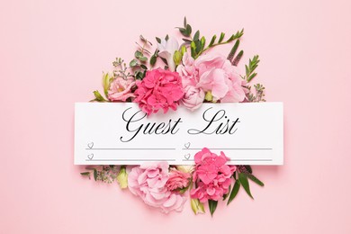 Image of Beautiful flowers and guest list on pink background, flat lay