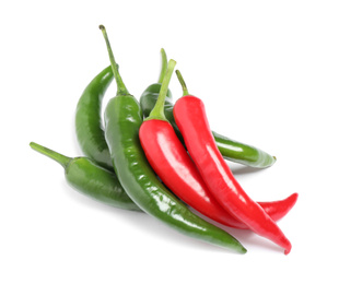 Ripe hot chili peppers on white background