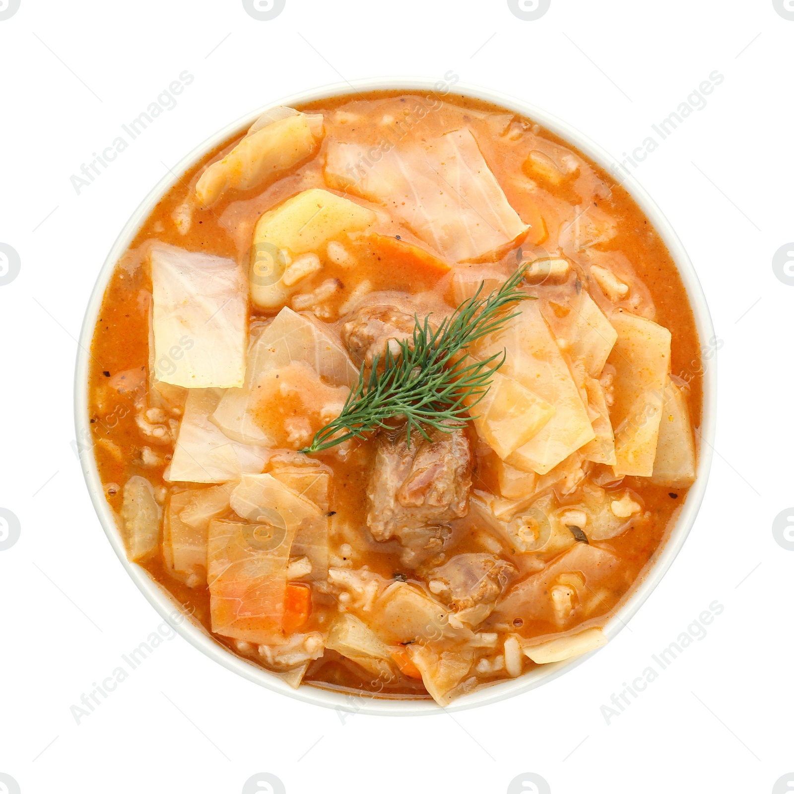 Photo of Tasty cabbage soup with meat, carrot and dill on white background, top view