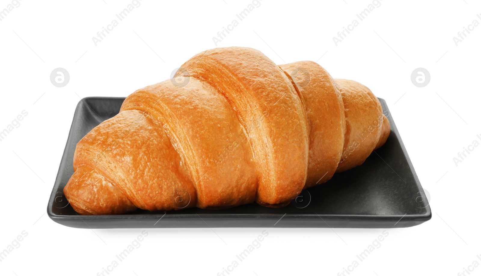 Photo of Plate with delicious fresh croissant isolated on white