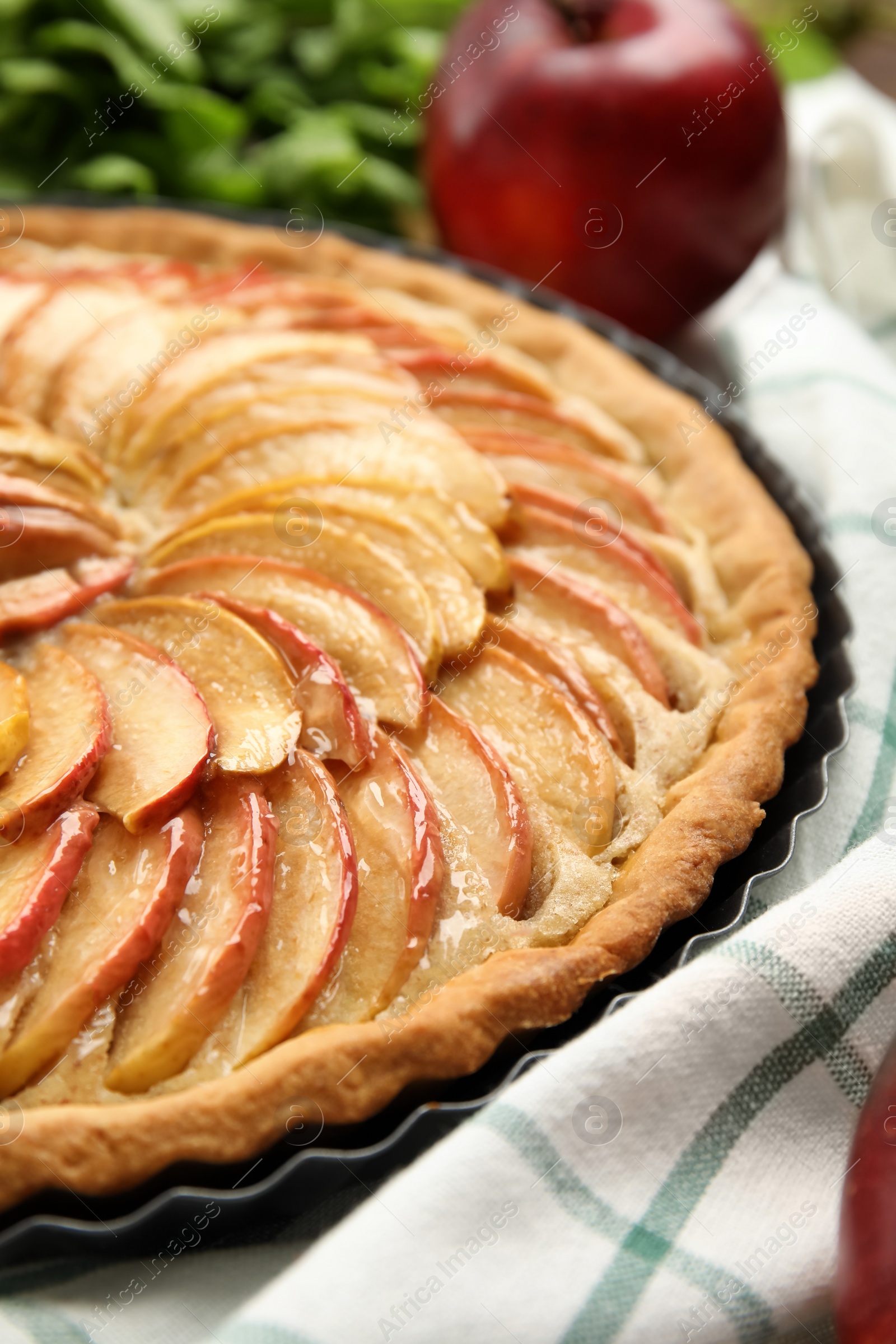 Photo of Delicious homemade apple tart on table, closeup
