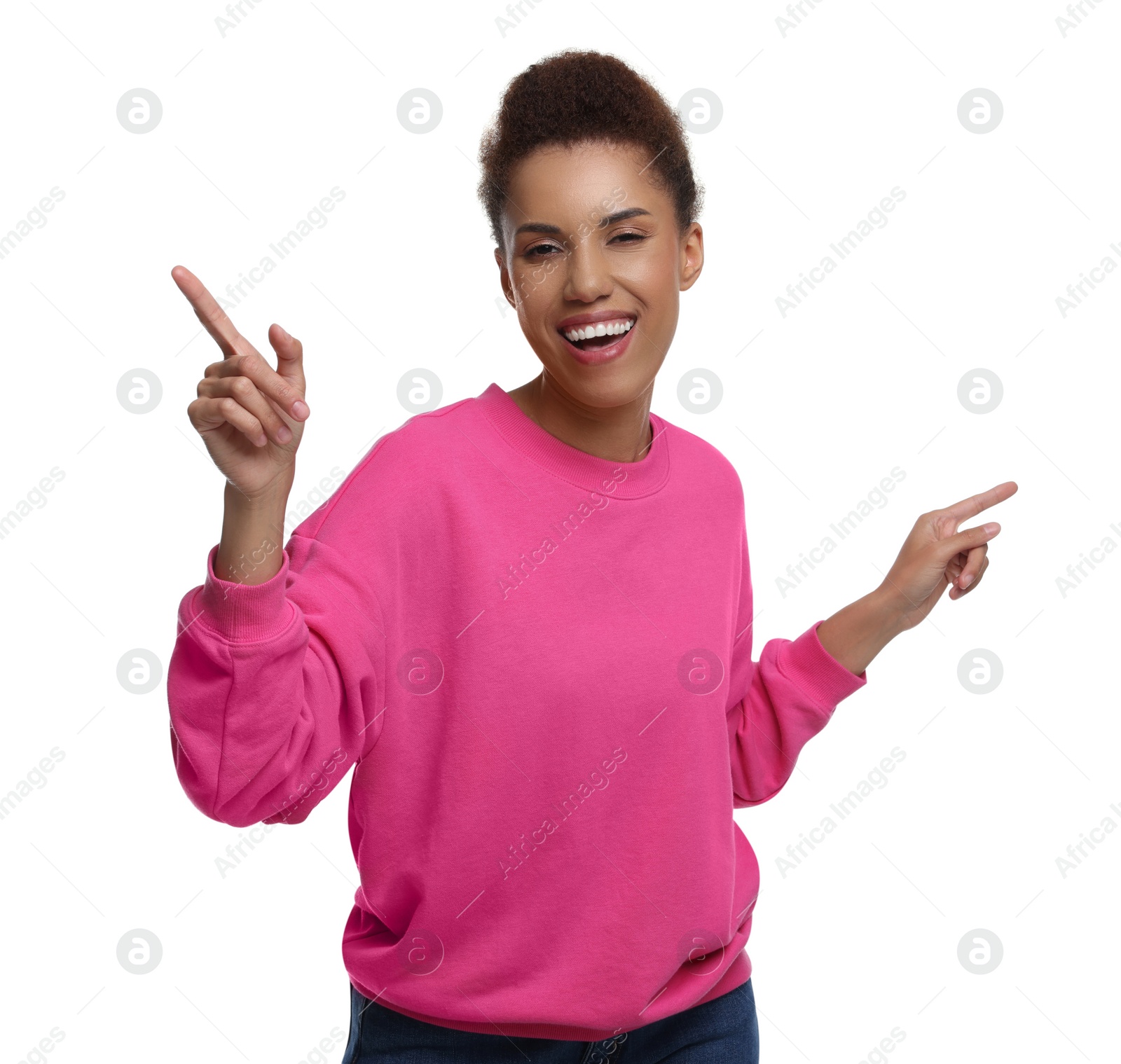 Photo of Happy young woman dancing on white background