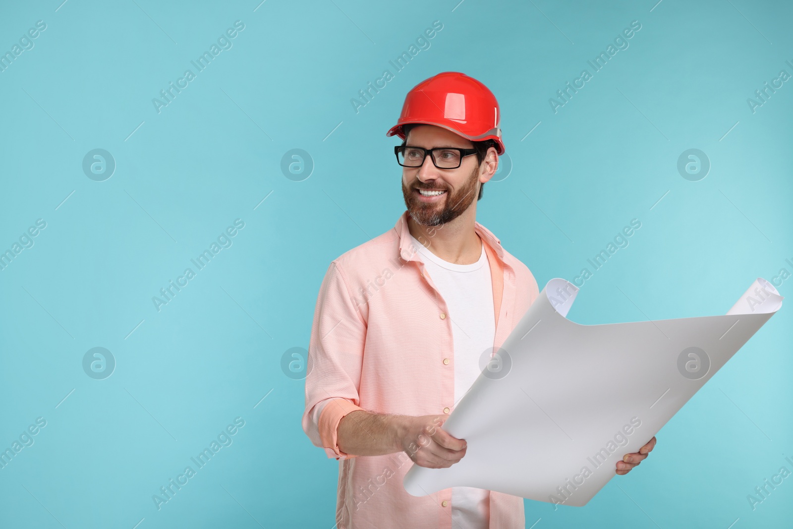 Photo of Architect in hard hat with draft on light blue background, space for text