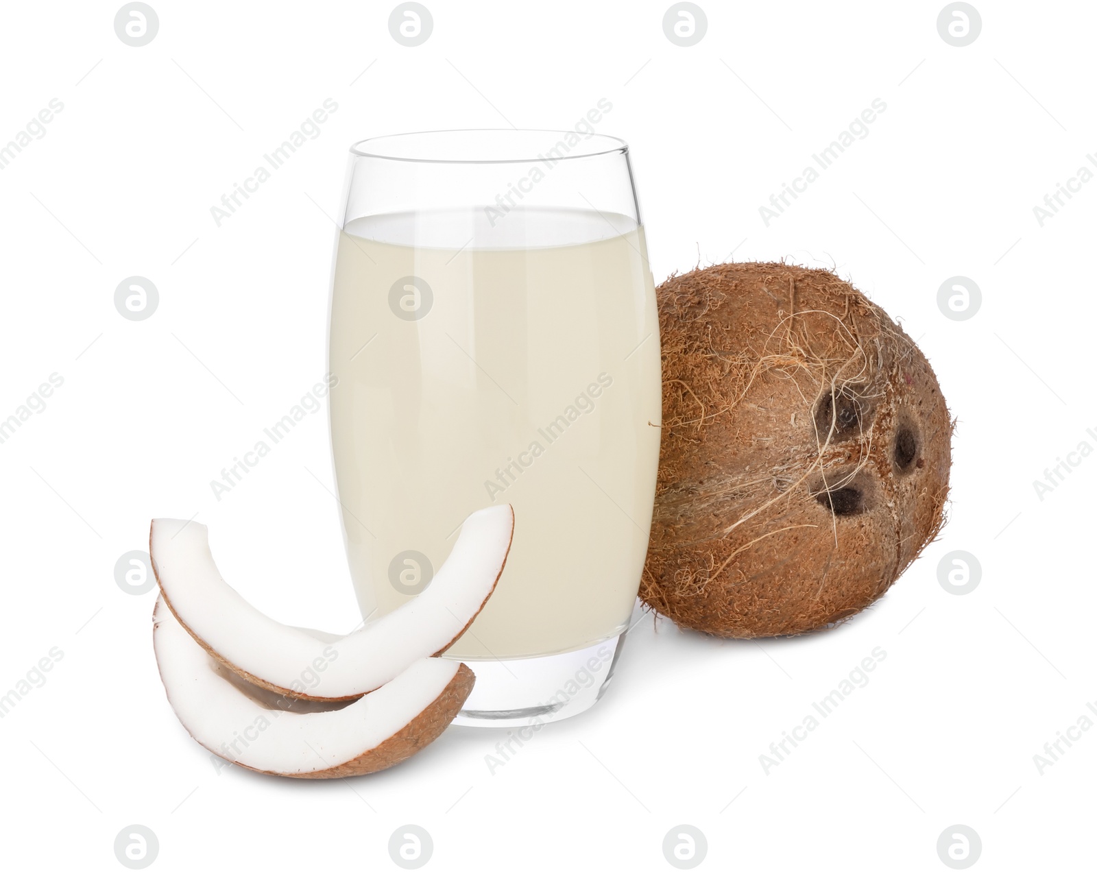 Photo of Glass of coconut water and nuts isolated on white