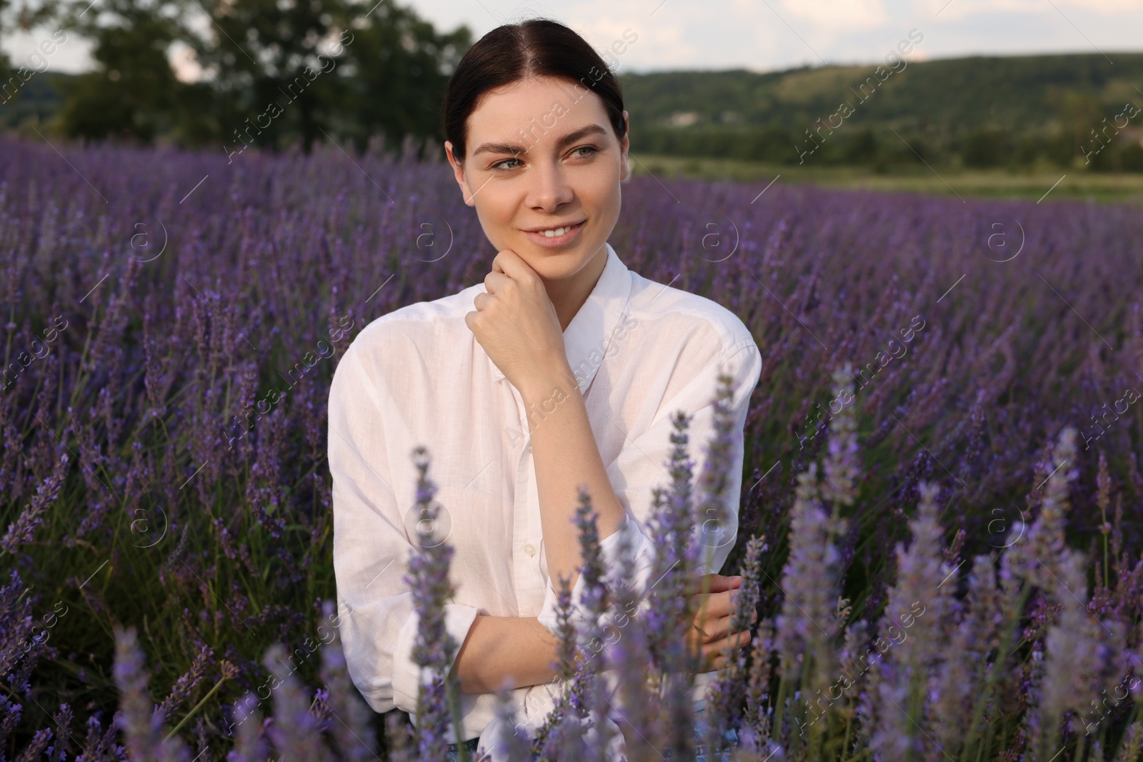 Photo of Portrait of smiling woman in lavender field