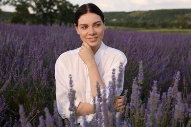 Photo of Portrait of smiling woman in lavender field