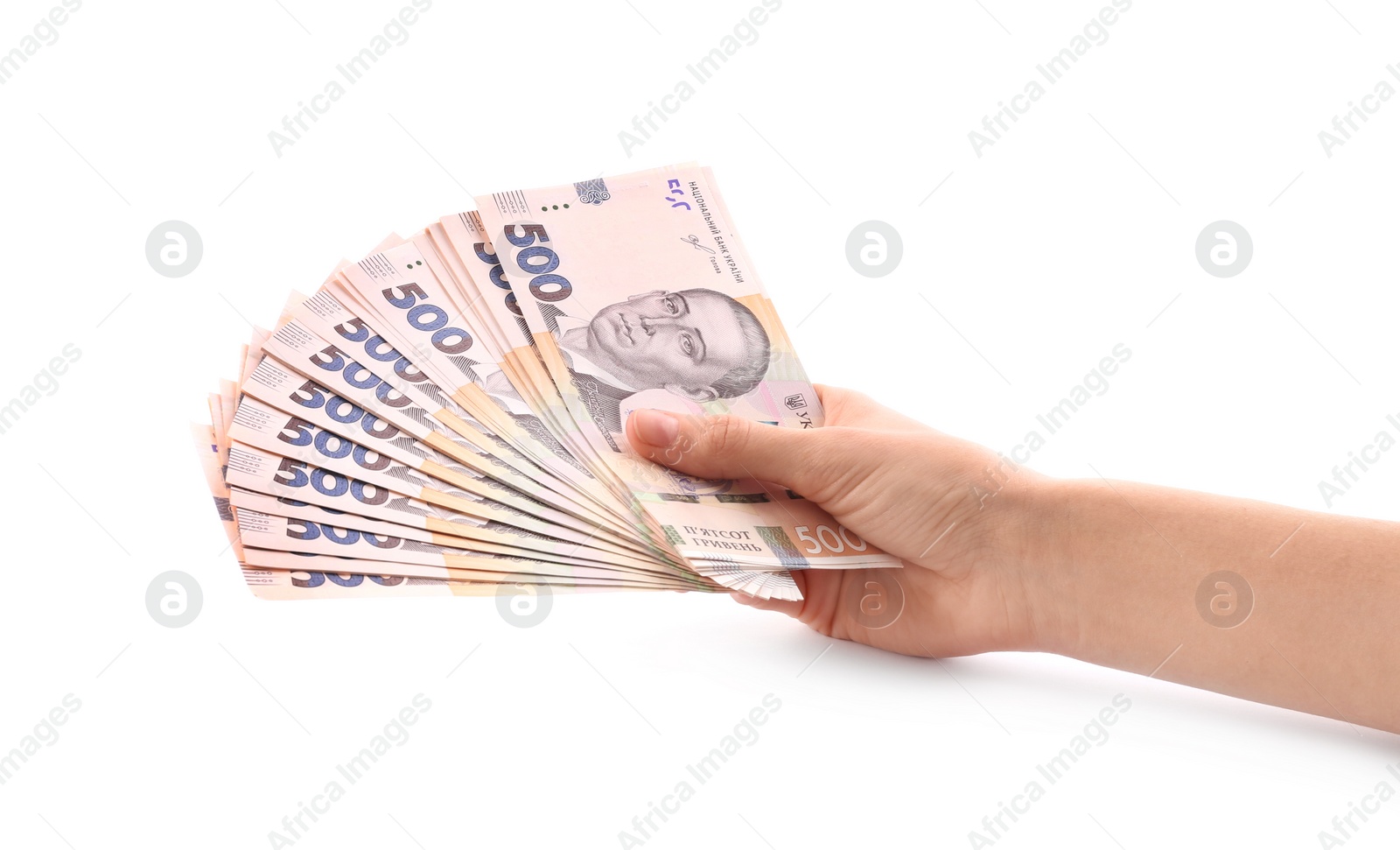 Photo of Woman holding Ukrainian money on white background, closeup