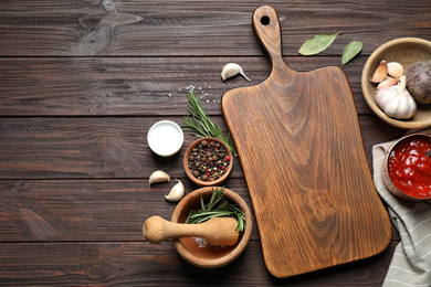 Flat lay composition with fresh products on wooden table, space for text. Healthy cooking