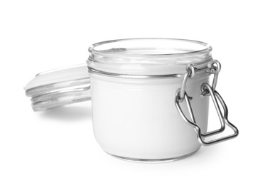 Glass jar with creamy yogurt on white background