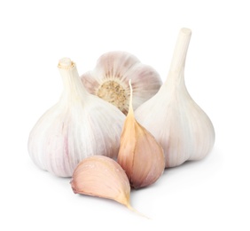 Fresh organic garlic bulbs and cloves on white background