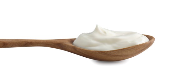 Photo of One wooden spoon with mayonnaise isolated on white