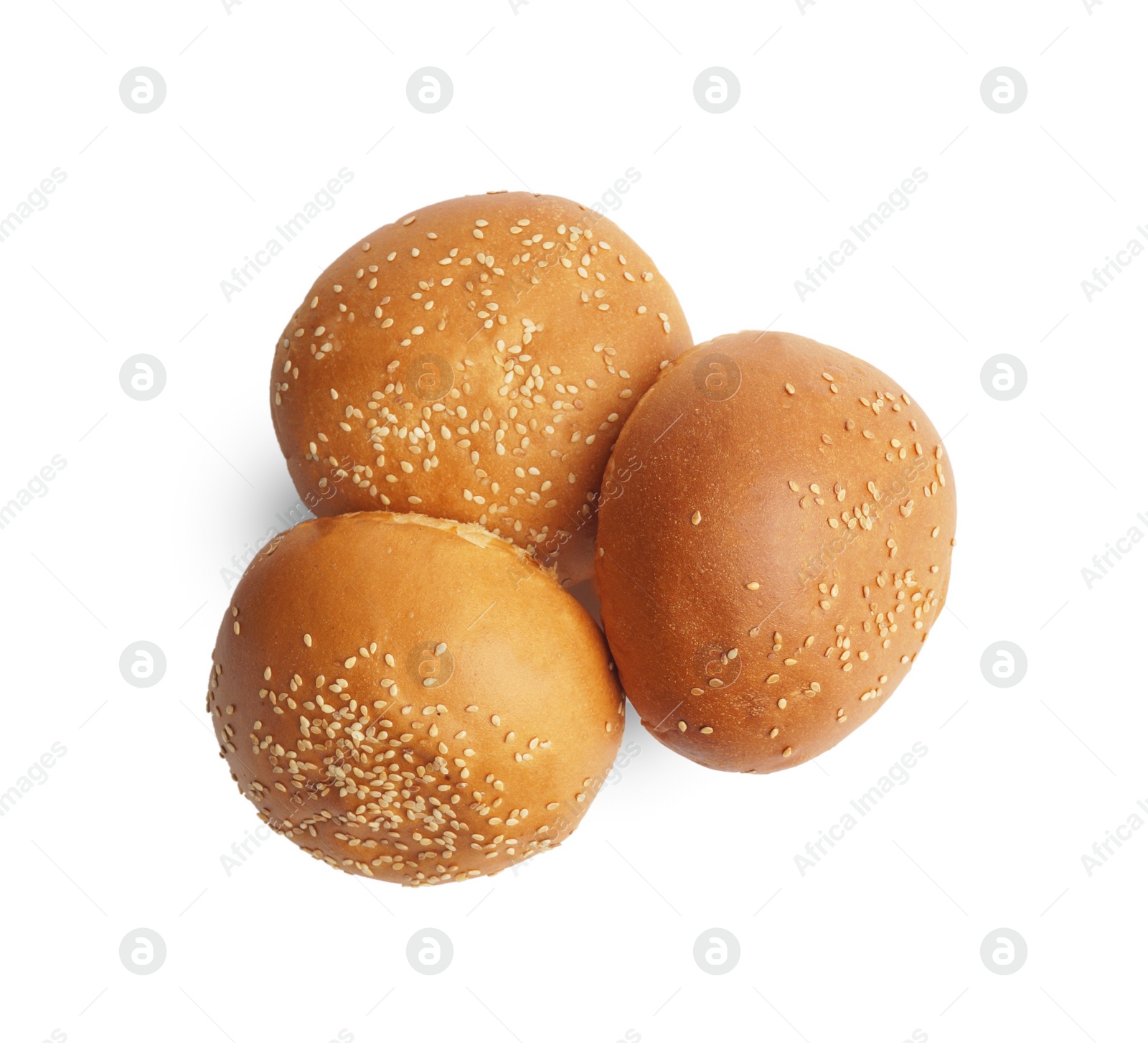 Photo of Fresh tasty buns with sesame seeds isolated on white, top view