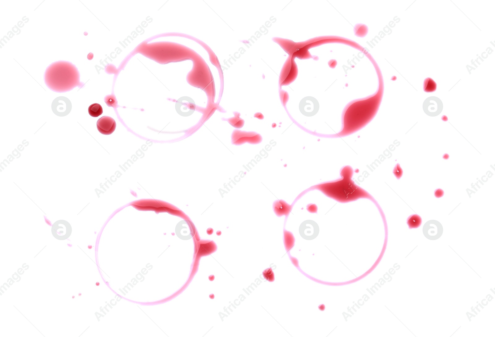 Photo of Many red wine rings and drops on white background, top view