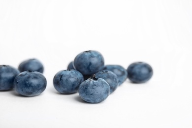 Photo of Tasty ripe blueberry on white background, closeup