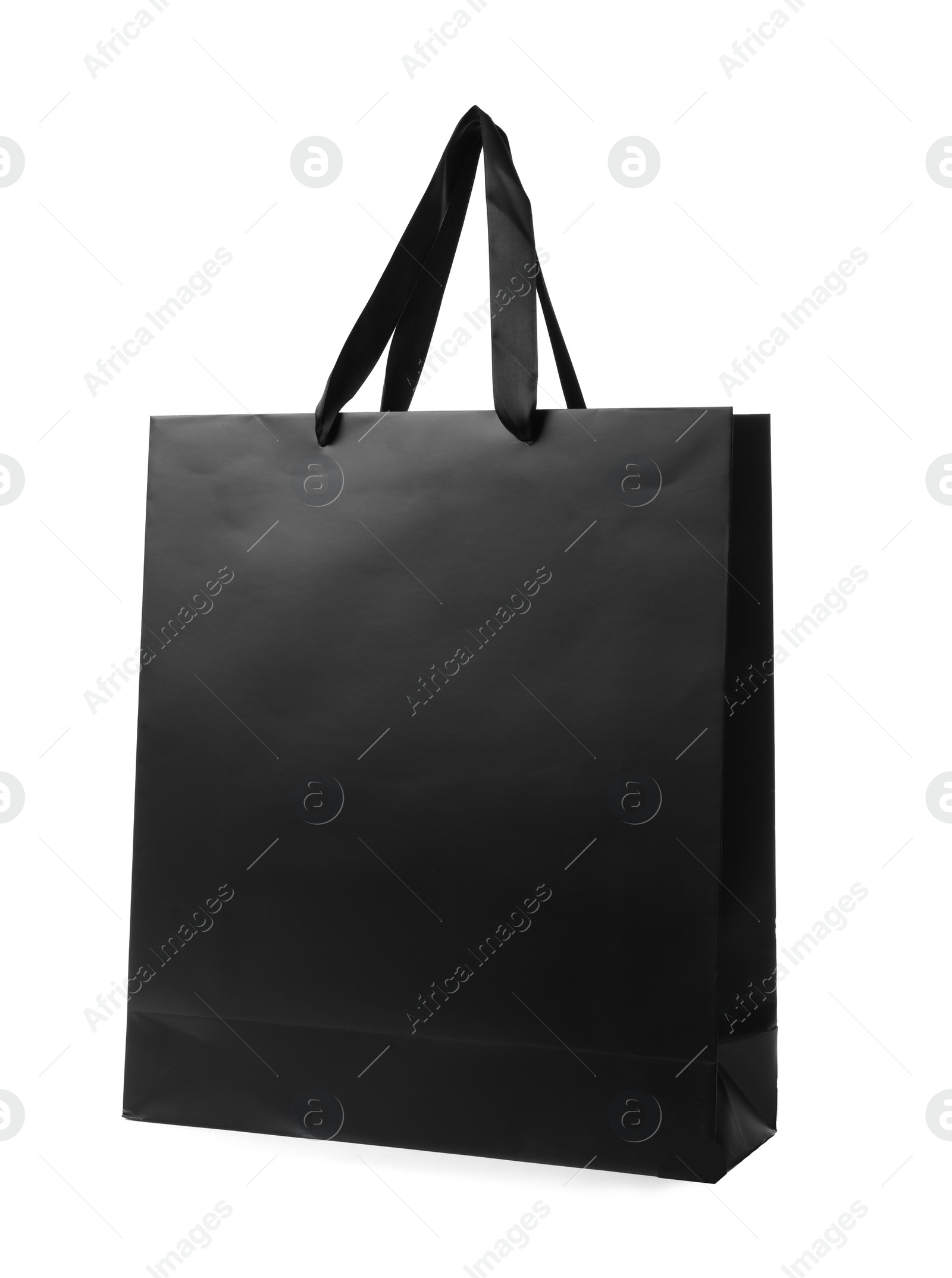 Photo of Paper shopping bag with handles on white background. Mockup for design