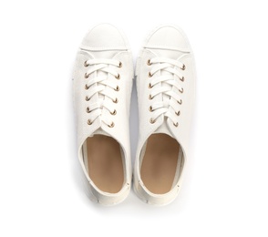 Pair of stylish sneakers on white background, top view