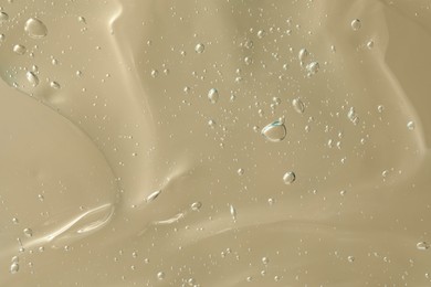 Transparent cleansing gel as background, closeup. Cosmetic product