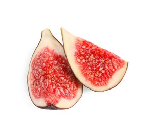 Photo of Pieces of fresh ripe fig isolated on white