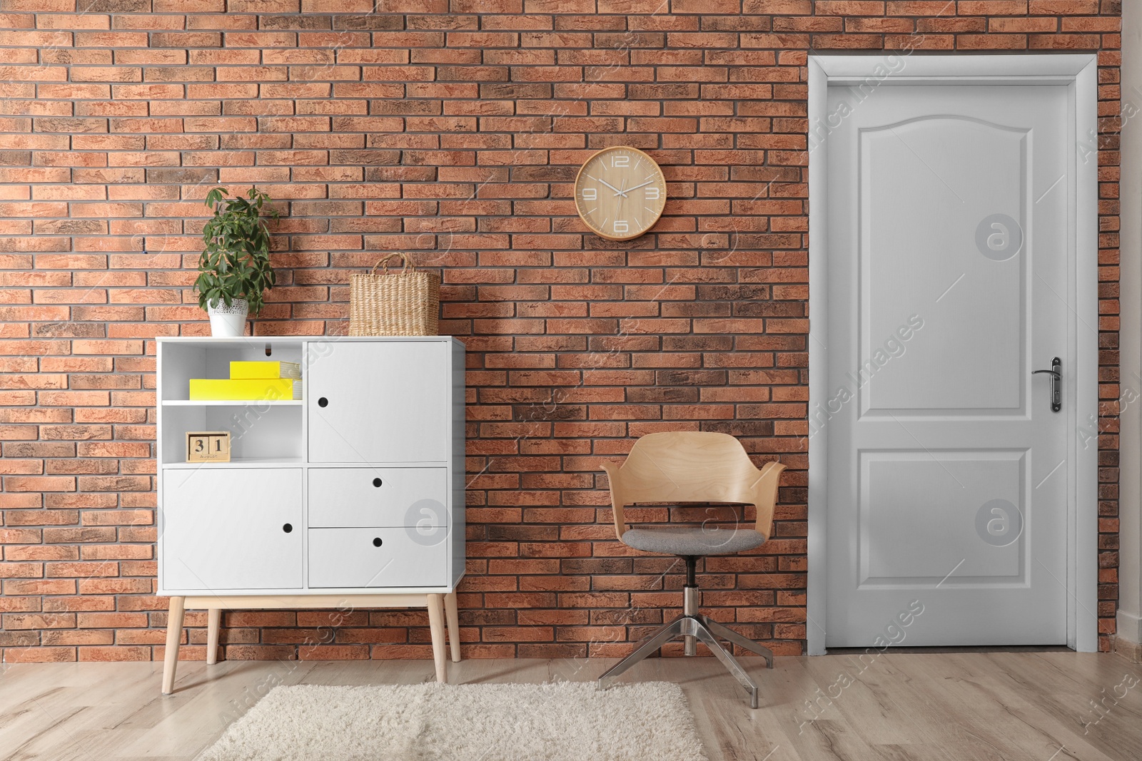 Photo of Chest of drawers in stylish living room interior