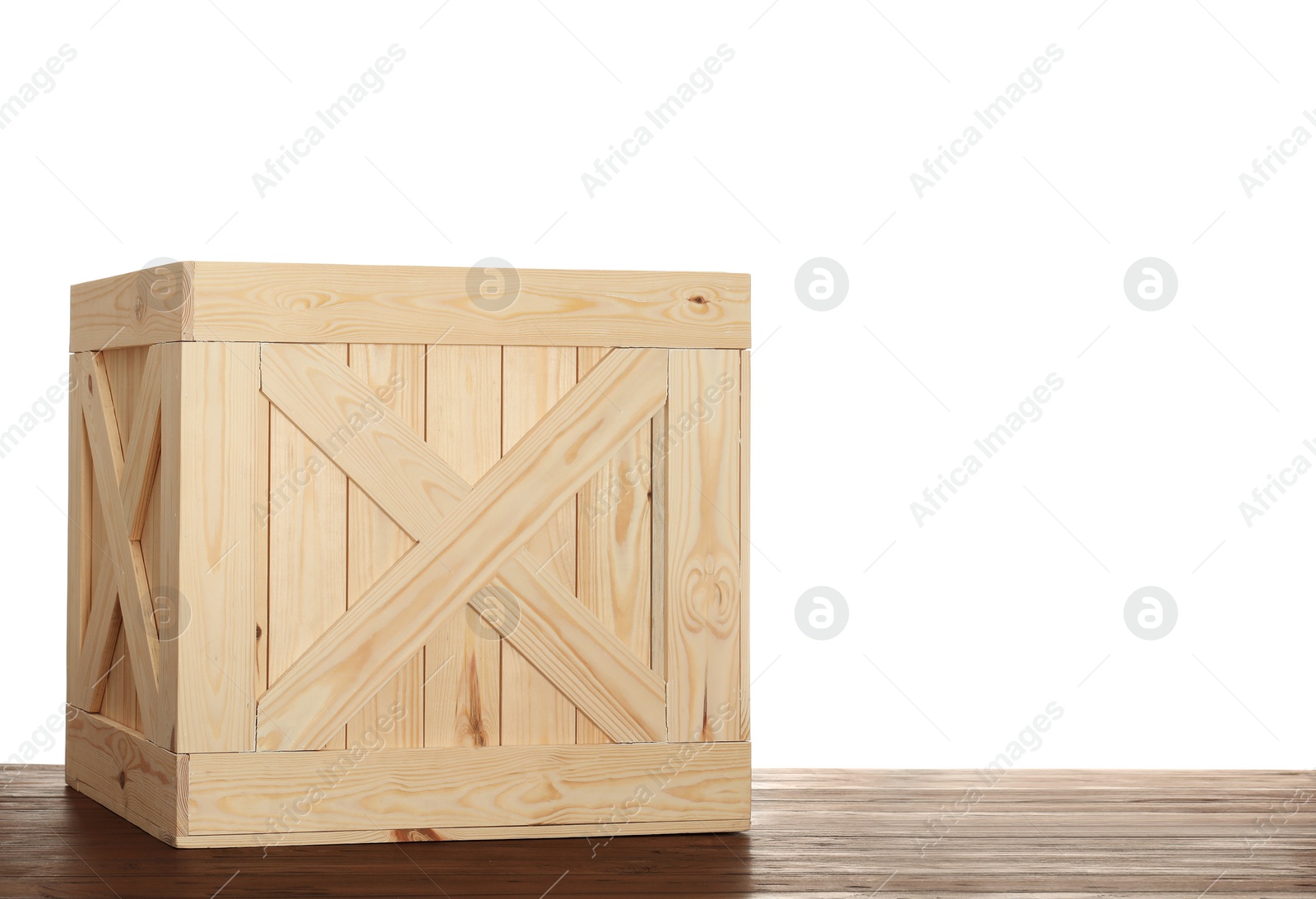 Photo of Wooden crate on table against white background. Space for text