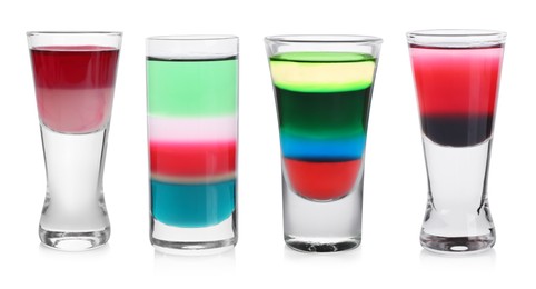 Different shooters in shot glasses isolated on white, set