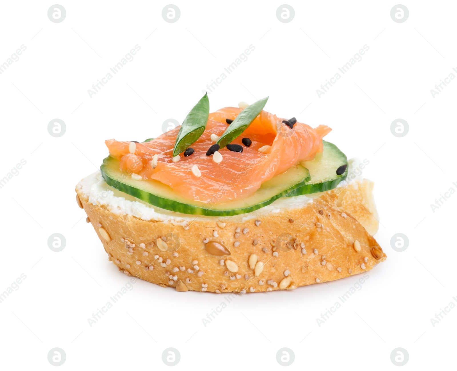 Photo of Tasty canape with salmon, cucumber and cream cheese isolated on white