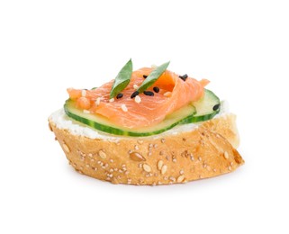 Photo of Tasty canape with salmon, cucumber and cream cheese isolated on white