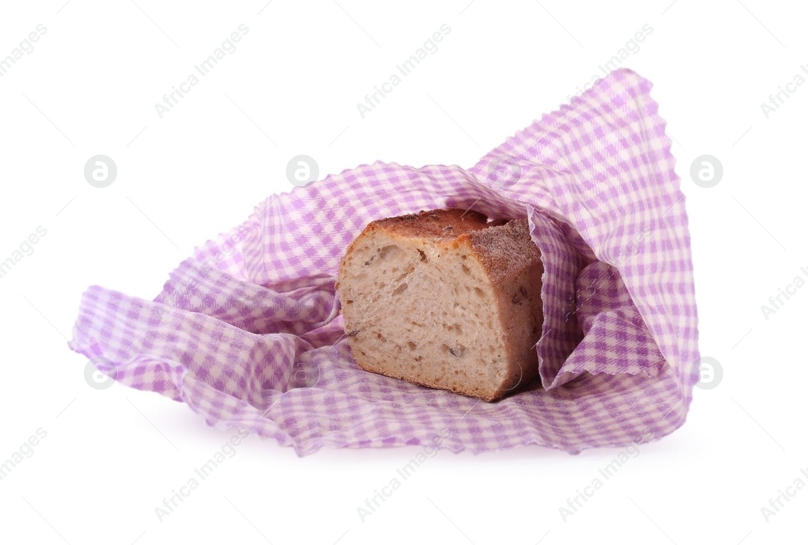 Photo of Bread in beeswax food wrap on white background