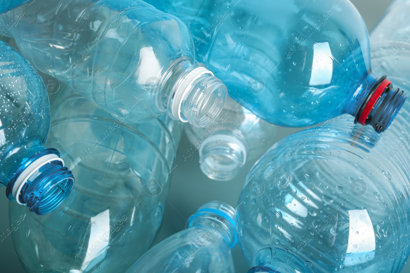 Photo of Many plastic bottles as background, closeup. Recycle concept