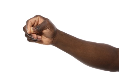 African-American man holding something in hand on white background, closeup