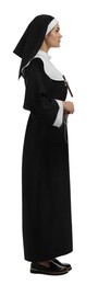 Young nun wearing cassock on white background
