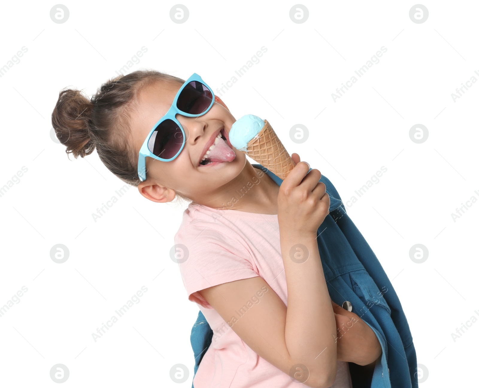 Photo of Adorable little girl with delicious ice cream on white background