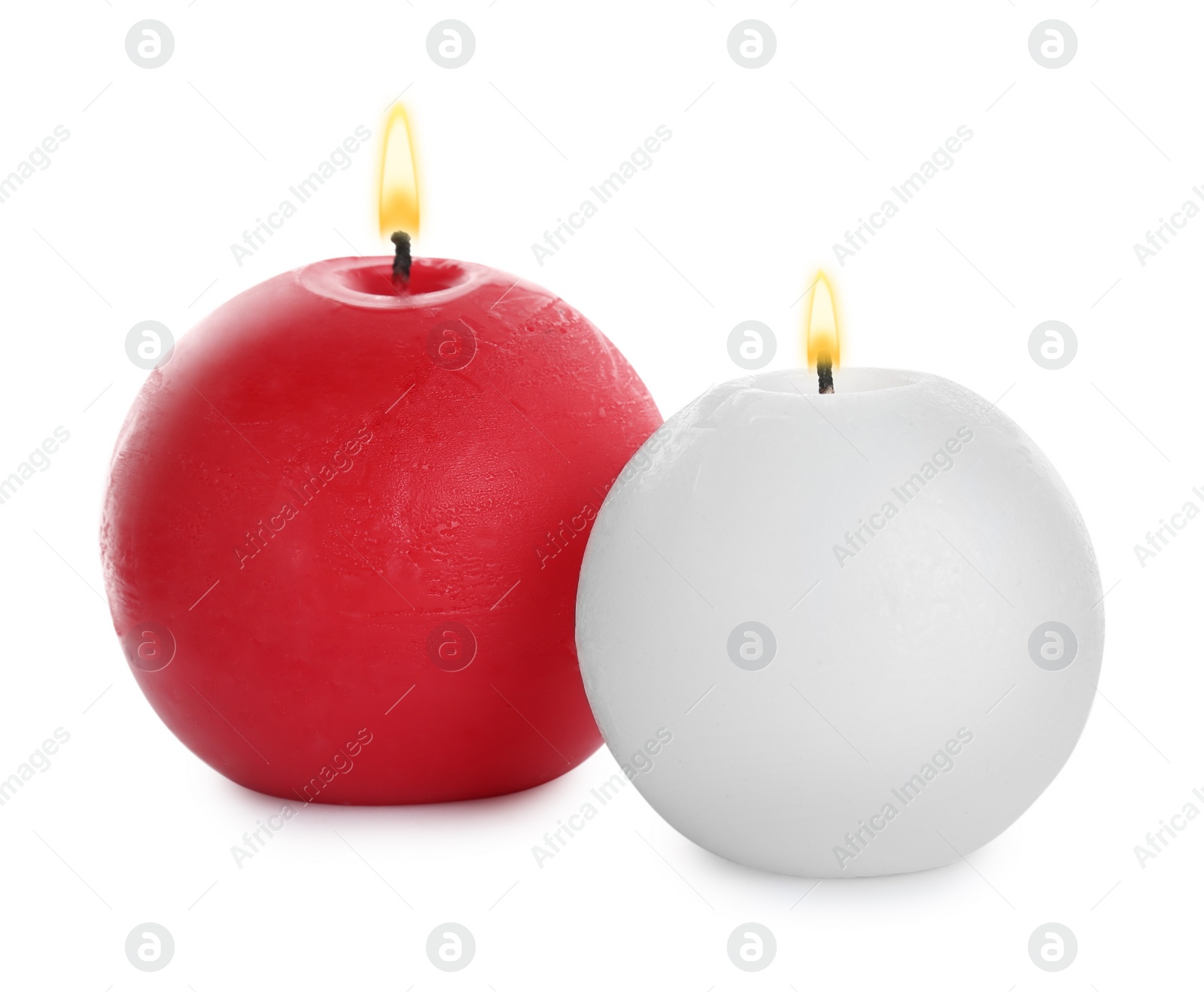 Photo of New wax candles on white background. Interior ellements