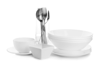 Different clean tableware on white background